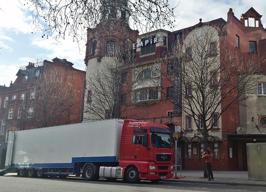 Red artic with a white trailer outside Shepherd’s Bush Empire